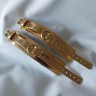 gold-colored leather bdsm wrist cuff, top view, handmade