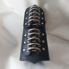 black leather fetish ring forearm guard, close-up, handmade