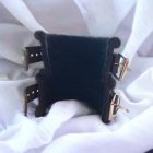 Furred leather wrist cuffs