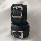 Black leather wrist cuffs