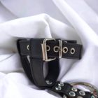 black leather bdsm penis cage, close-up, handmade