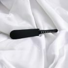 Black leather paddle with wooden handle