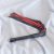 Red and black leather flogger