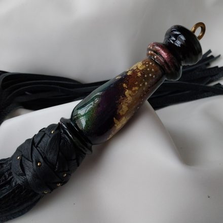 BDSM leather whip with painted handle
