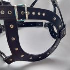 black bdsm decorative leather breast harness, close-up, handmade