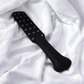 Spanking device riveted 