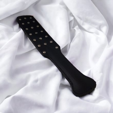 Spanking device riveted 